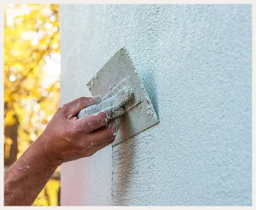 Verputzen der Außenwand