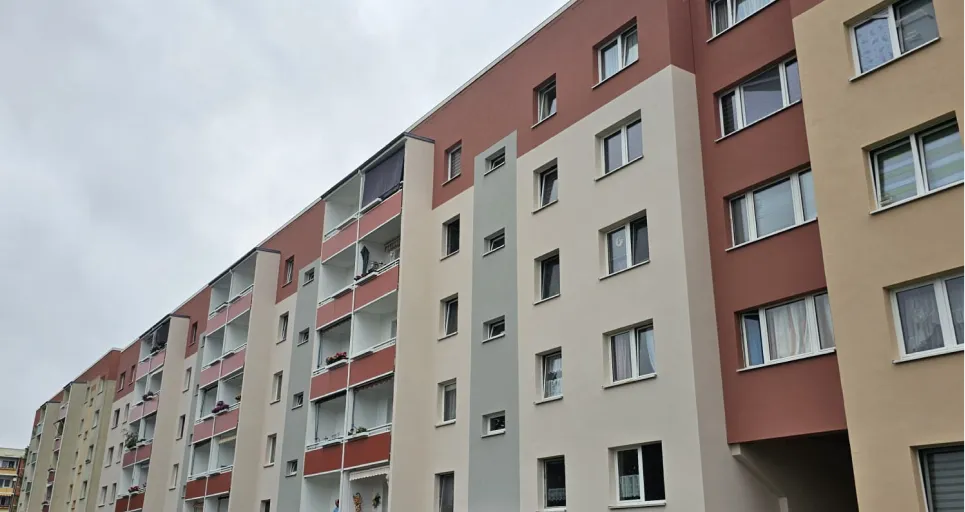 Referenzbild einer Fassade eines Wohnblocks